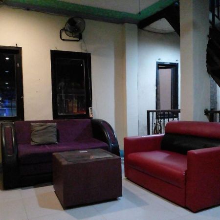 Hotel Alifah 1 Syariah Rawabokor Dua ภายนอก รูปภาพ