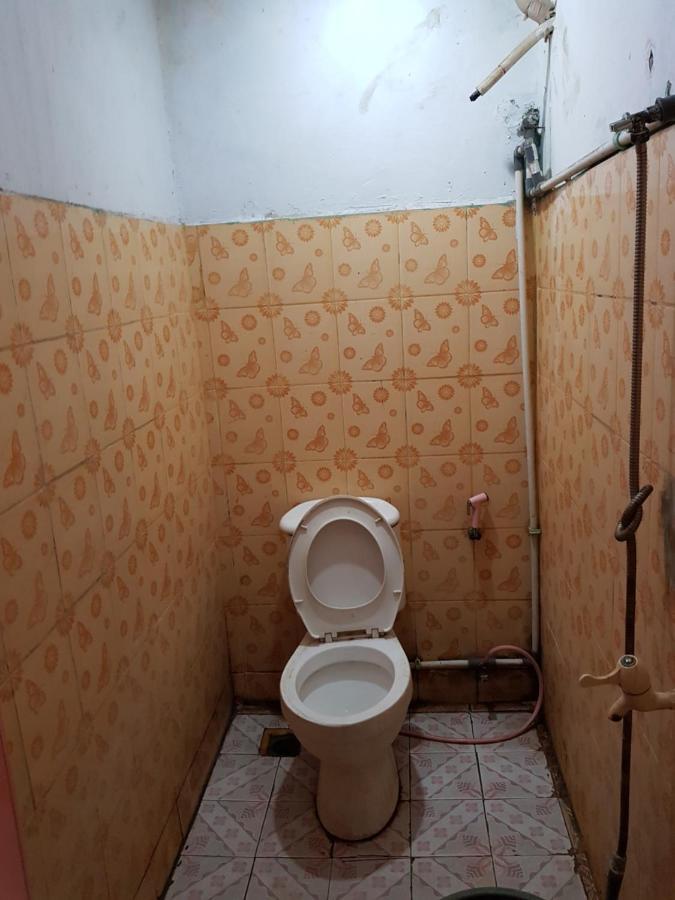 Hotel Alifah 1 Syariah Rawabokor Dua ภายนอก รูปภาพ