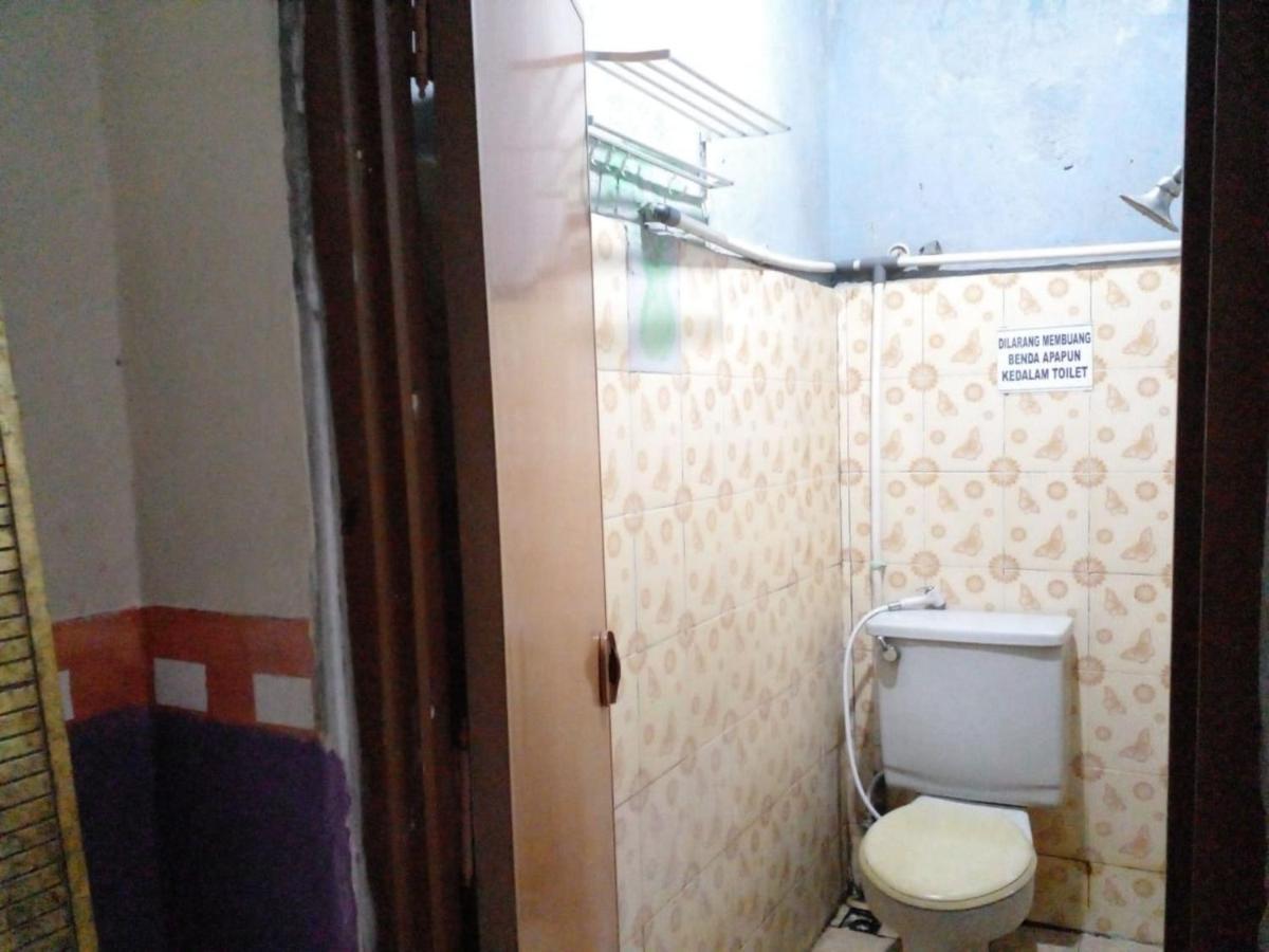 Hotel Alifah 1 Syariah Rawabokor Dua ภายนอก รูปภาพ