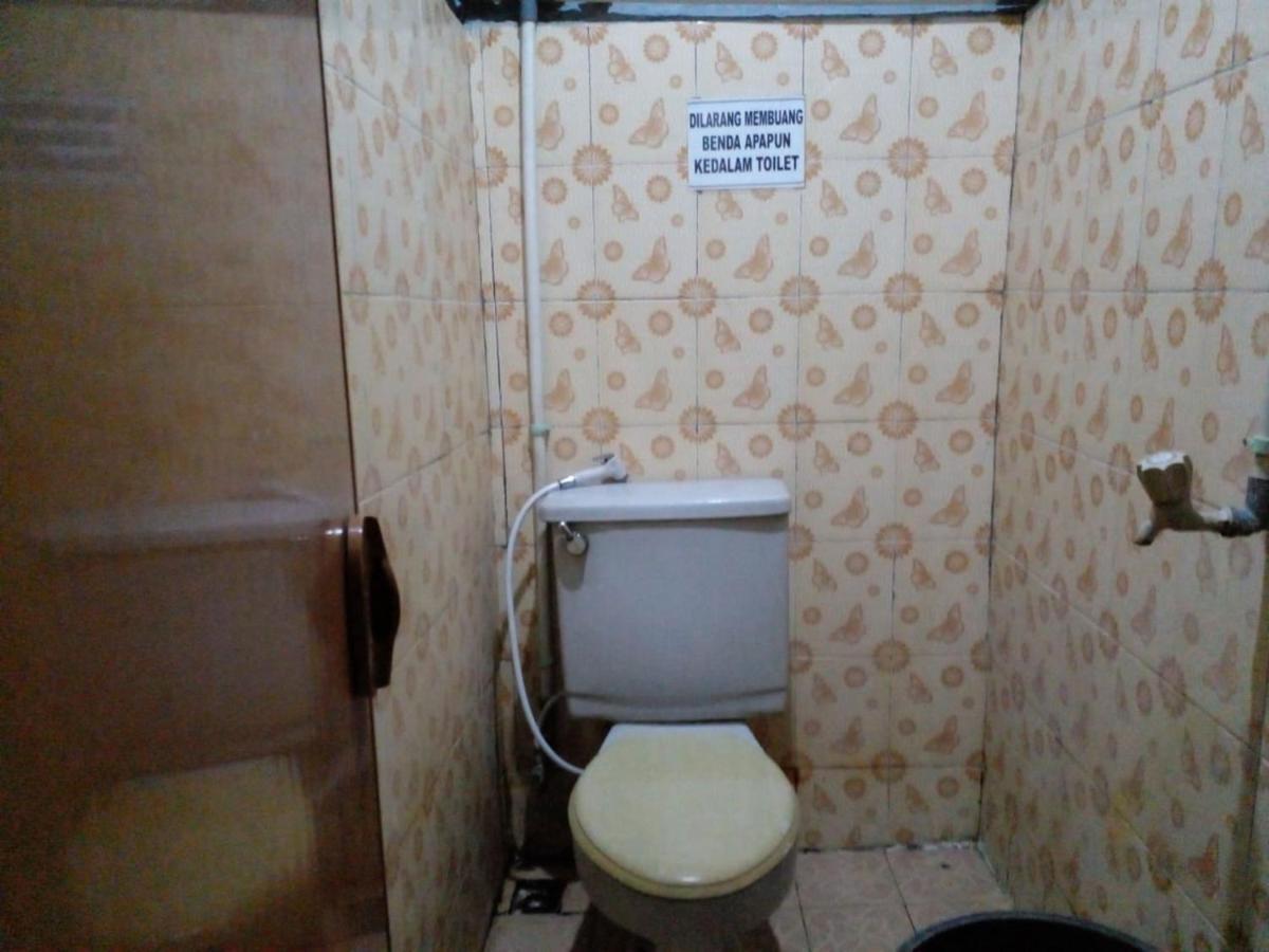 Hotel Alifah 1 Syariah Rawabokor Dua ภายนอก รูปภาพ