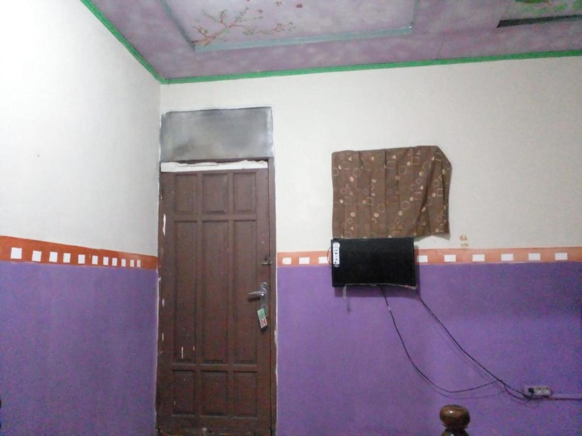 Hotel Alifah 1 Syariah Rawabokor Dua ภายนอก รูปภาพ