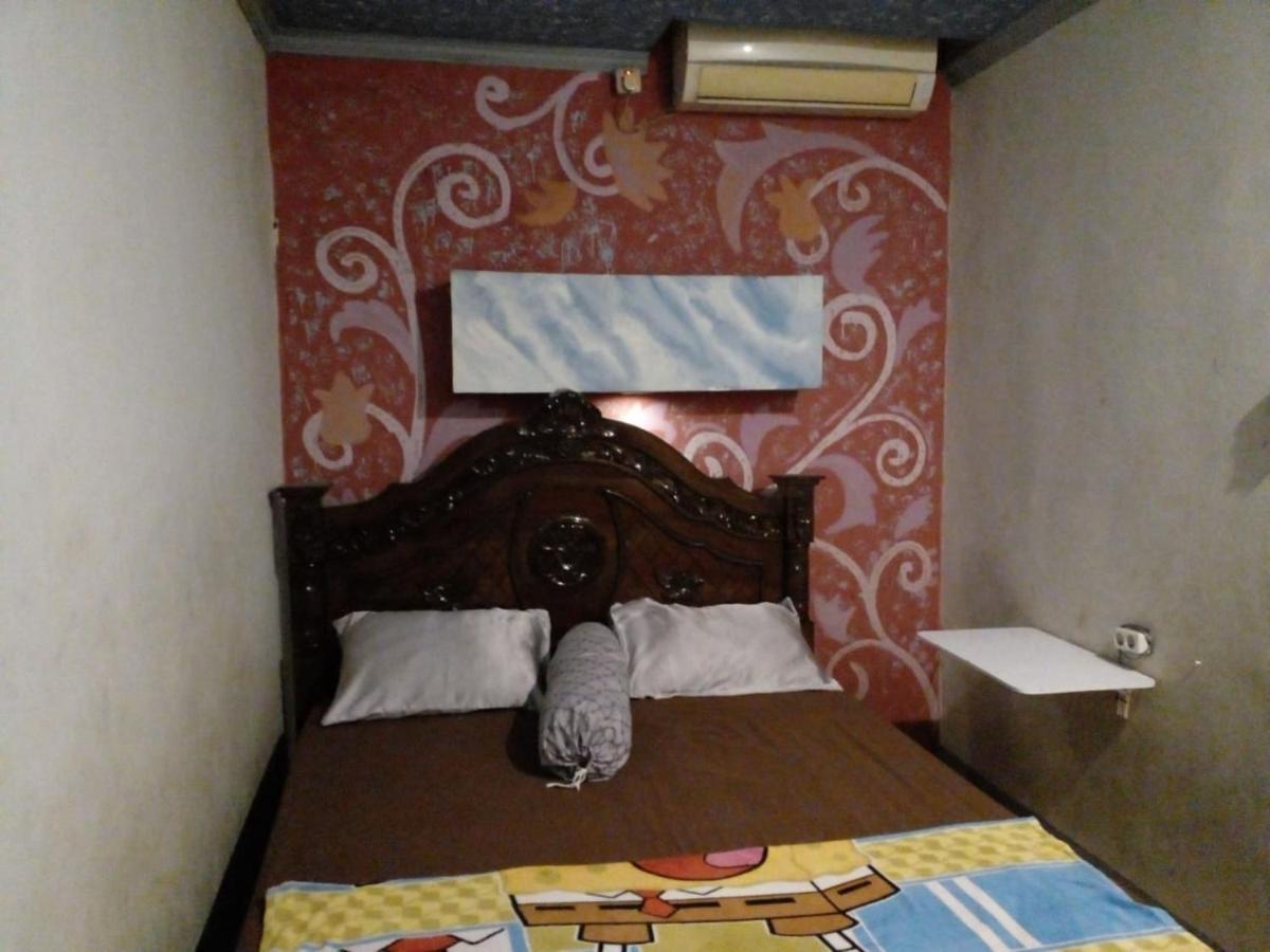 Hotel Alifah 1 Syariah Rawabokor Dua ภายนอก รูปภาพ